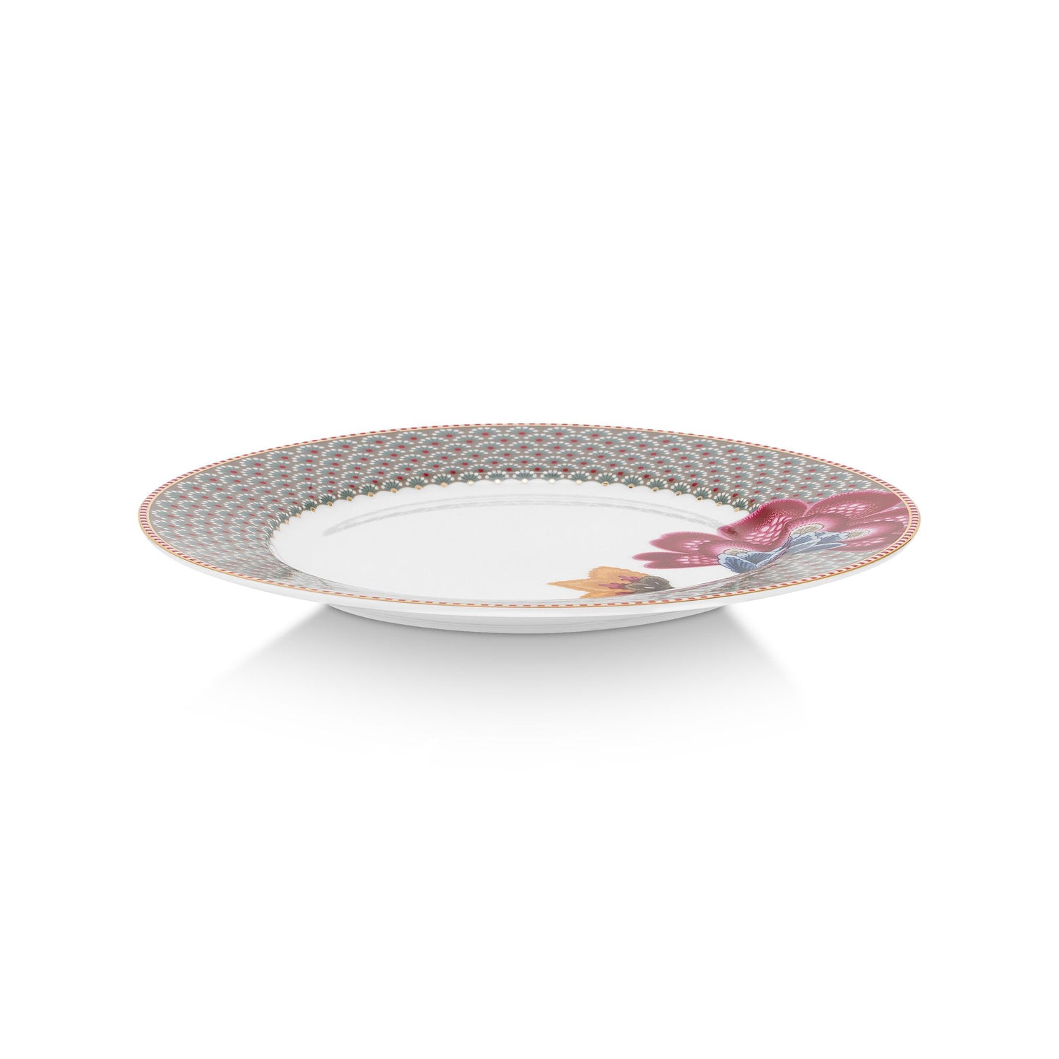 Decorative plate with floral design on a white background
