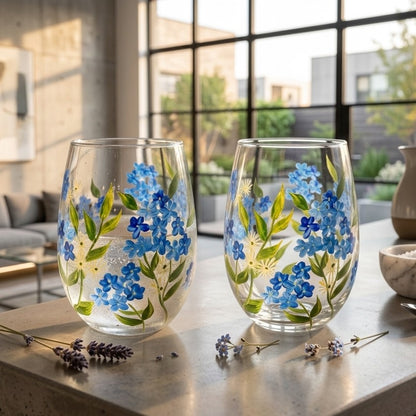 Livellara Milano waterglazen met blauw bloemendessin op zomerse tafel