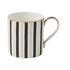 Mok zwart wit gestreept en gouden accenten. porselein. 
